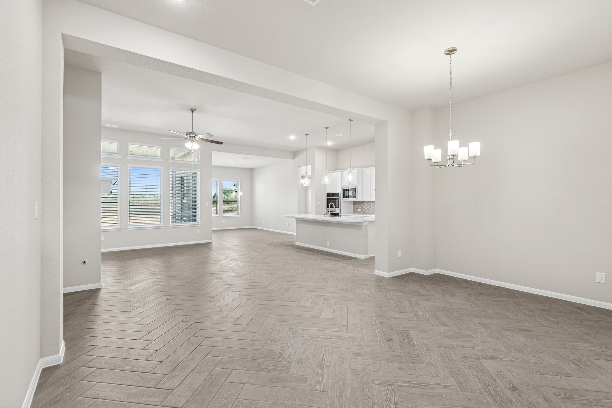 6715 Allens Landing Needville, TX 77461 - Photo 4 of 40 a view of an empty room with a kitchen