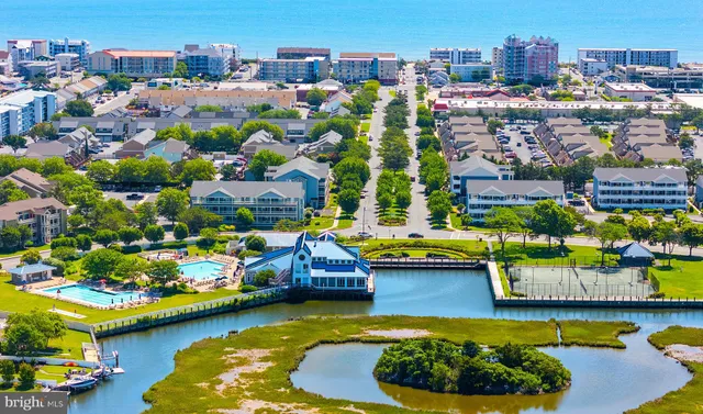 an aerial view of a house with outdoor space