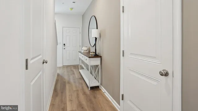 a bathroom with a sink and mirror with toilet