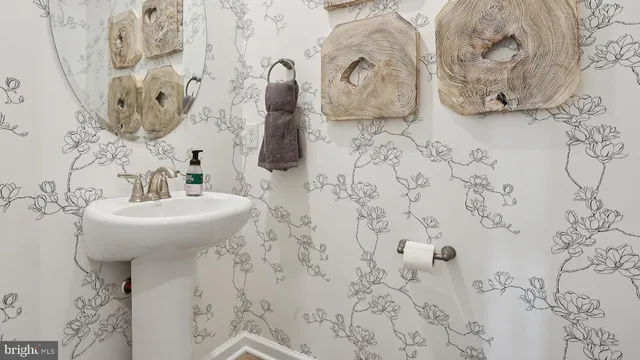 a kitchen with a sink stove and refrigerator