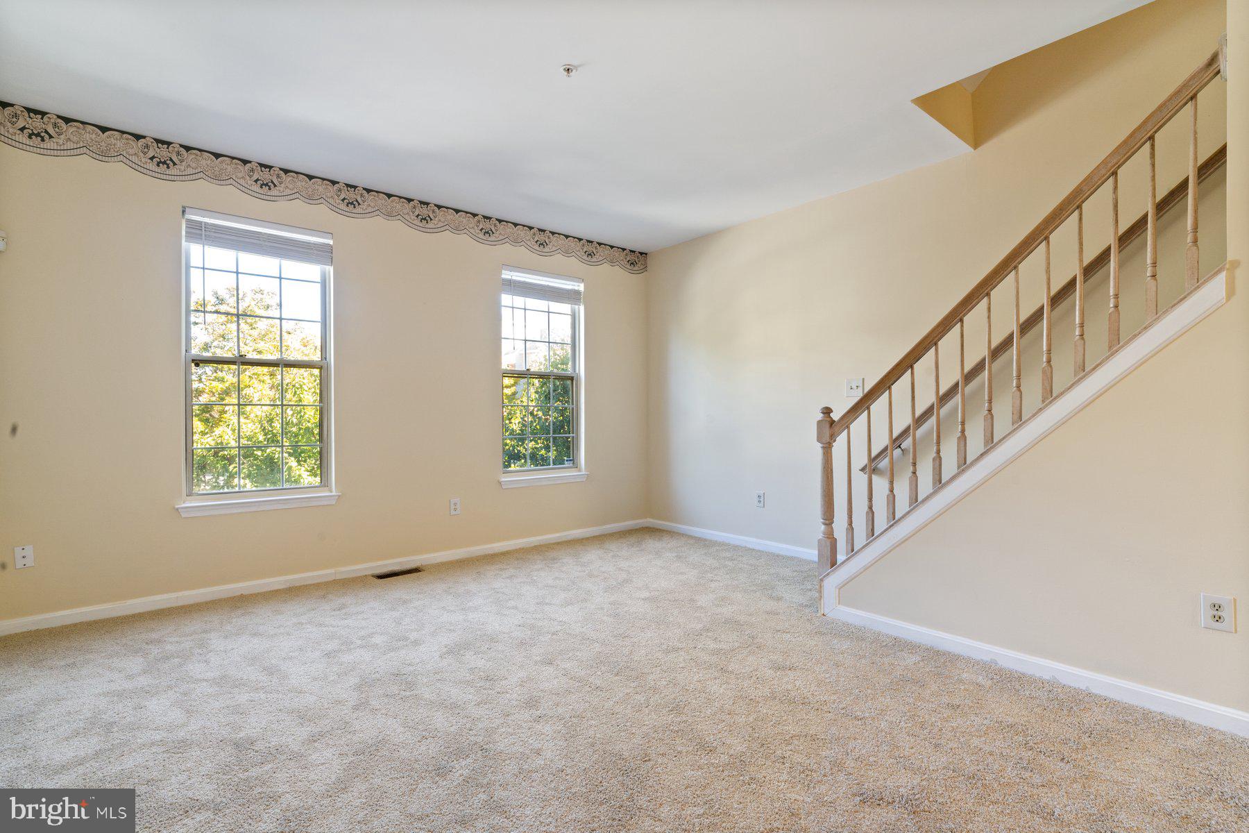 11 Bank Spring Court Owings Mills, MD 21117 - Photo 16 of 35 an empty room with windows