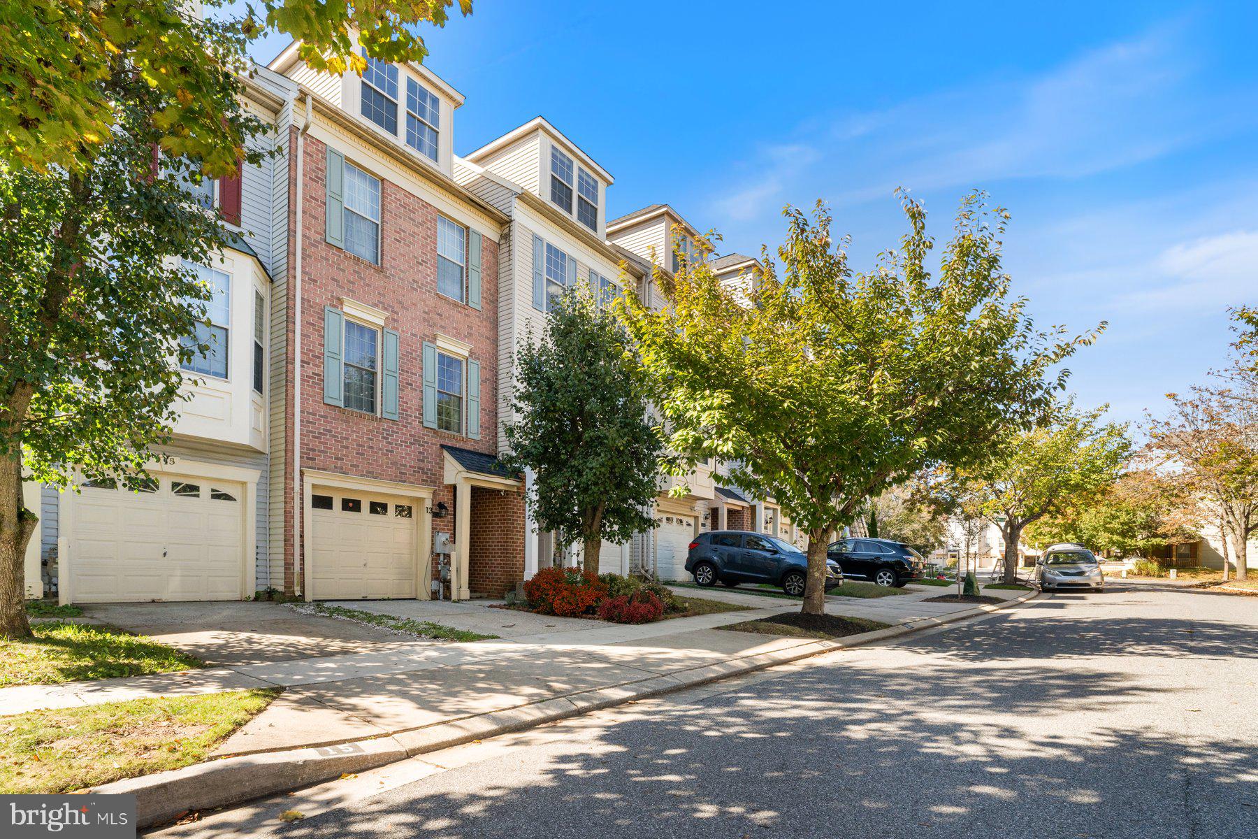 11 Bank Spring Court Owings Mills, MD 21117 - Photo 2 of 35 a view of a street with houses