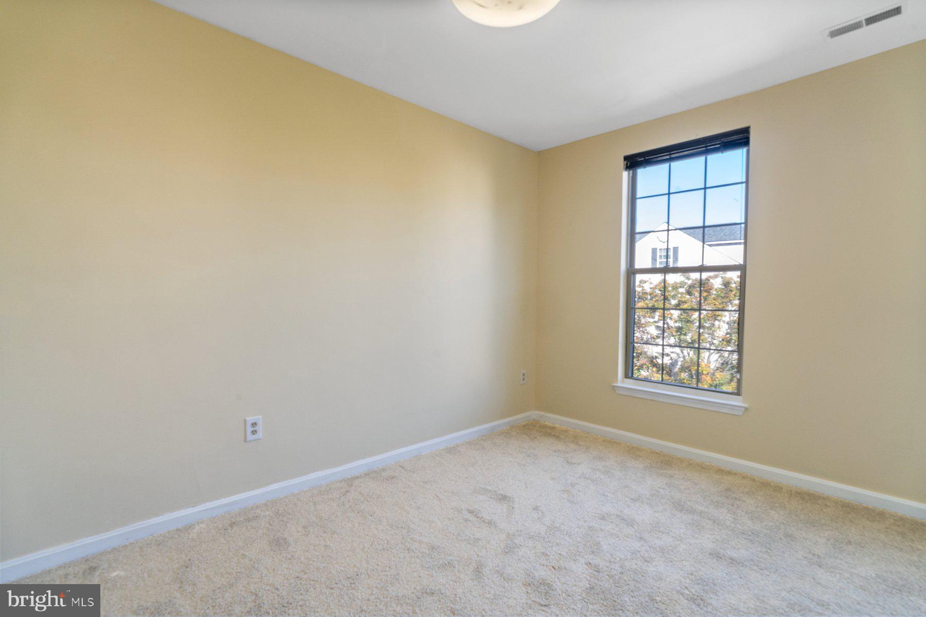 11 Bank Spring Court Owings Mills, MD 21117 - Photo 22 of 35 a view of an empty room and window