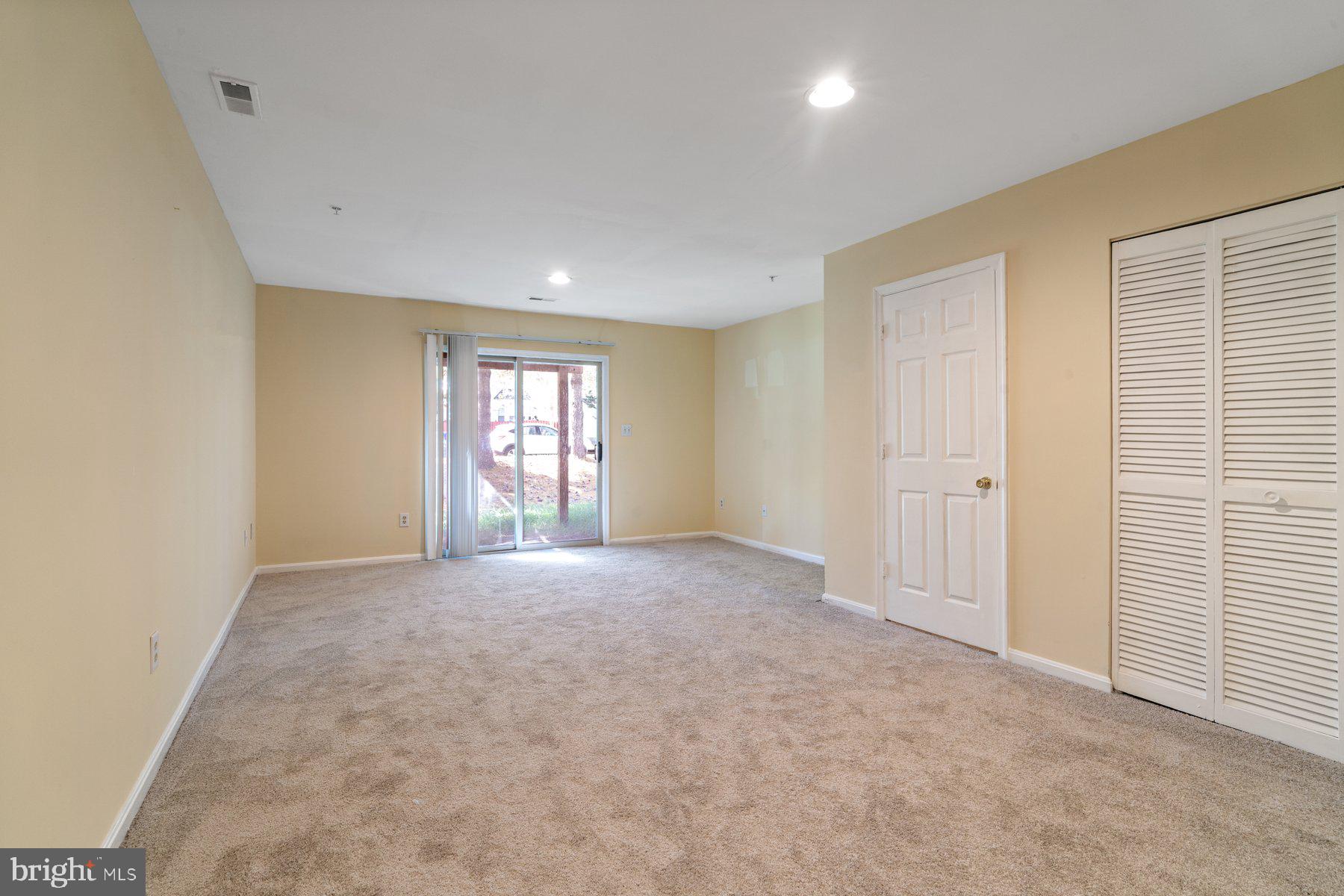 11 Bank Spring Court Owings Mills, MD 21117 - Photo 6 of 35 a view of an empty room and window