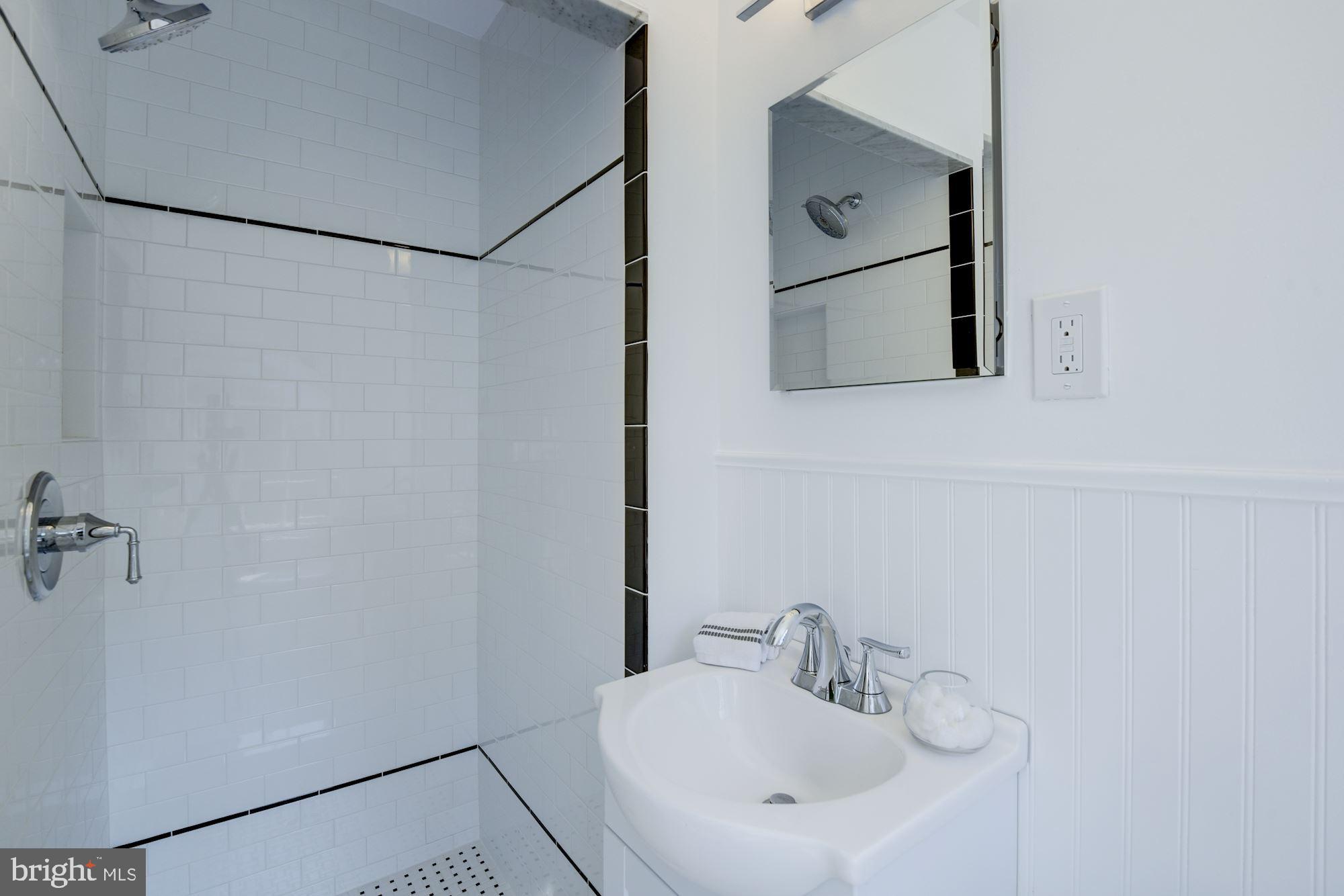 5909 Gloster Road Bethesda, MD 20816 - Photo 24 of 39 MBA with fully tiled shower stall, rain showerhead