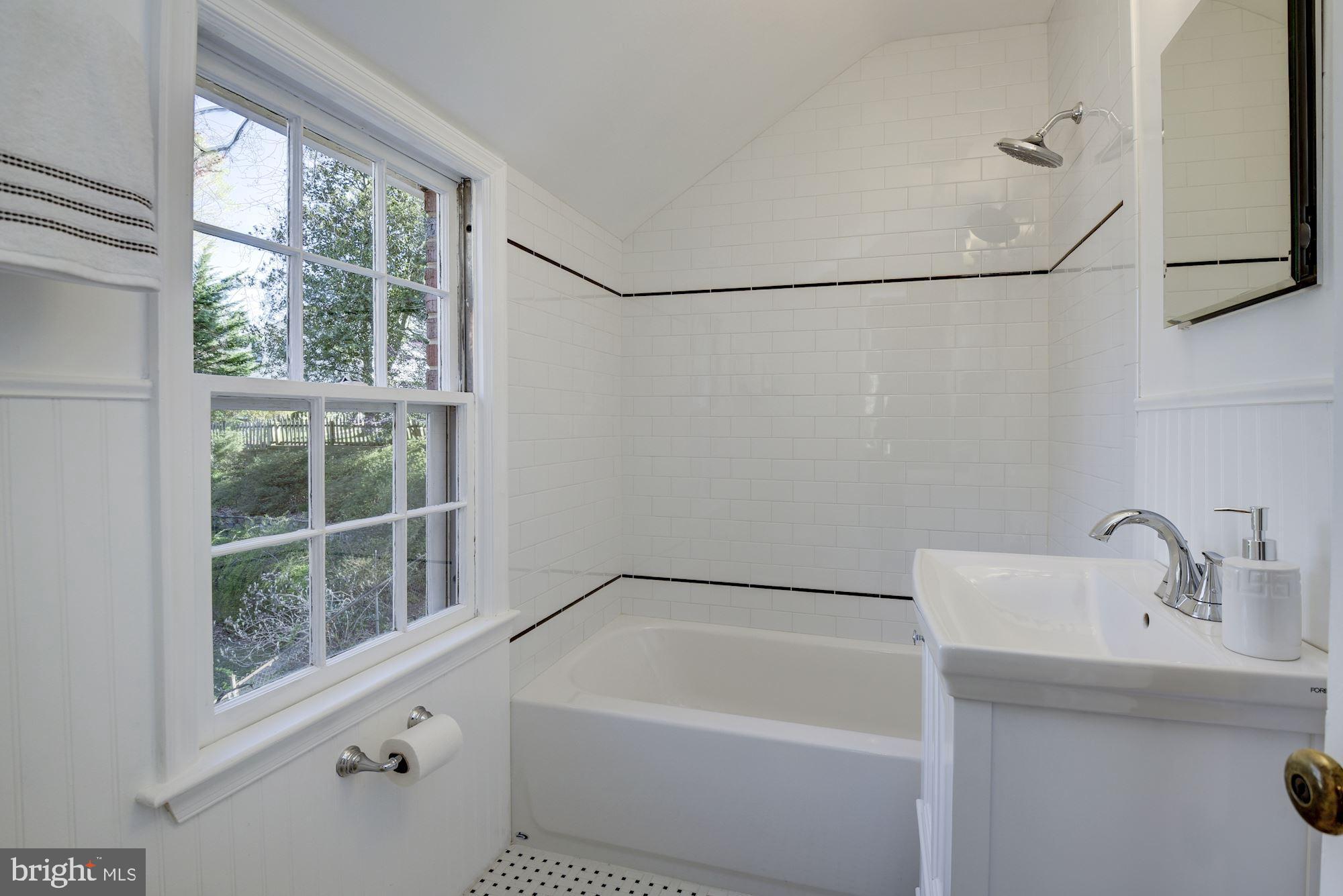5909 Gloster Road Bethesda, MD 20816 - Photo 27 of 39 Total new renovation: hall bath with tub