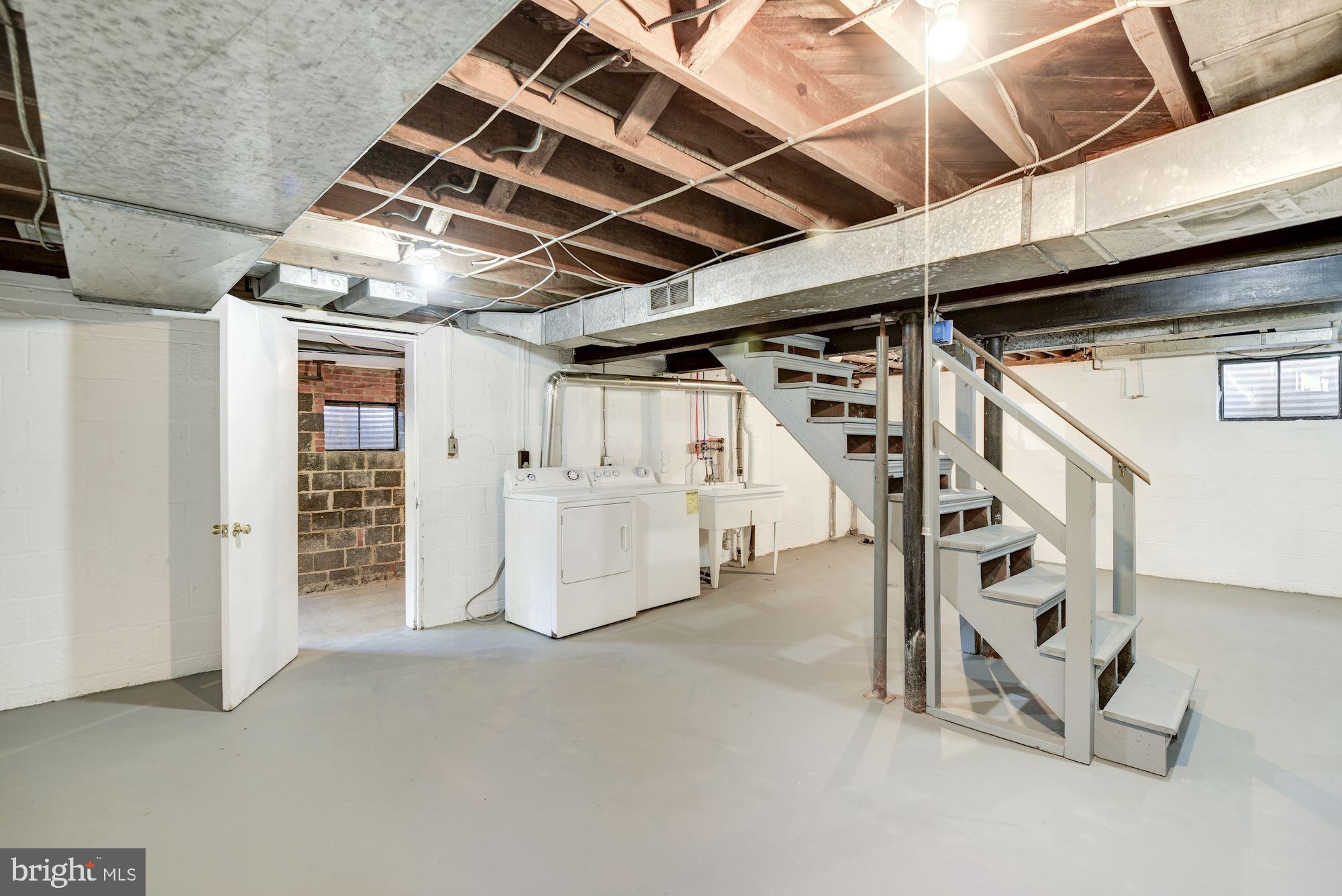 5909 Gloster Road Bethesda, MD 20816 - Photo 30 of 39 Lower Level with laundry and access to garage