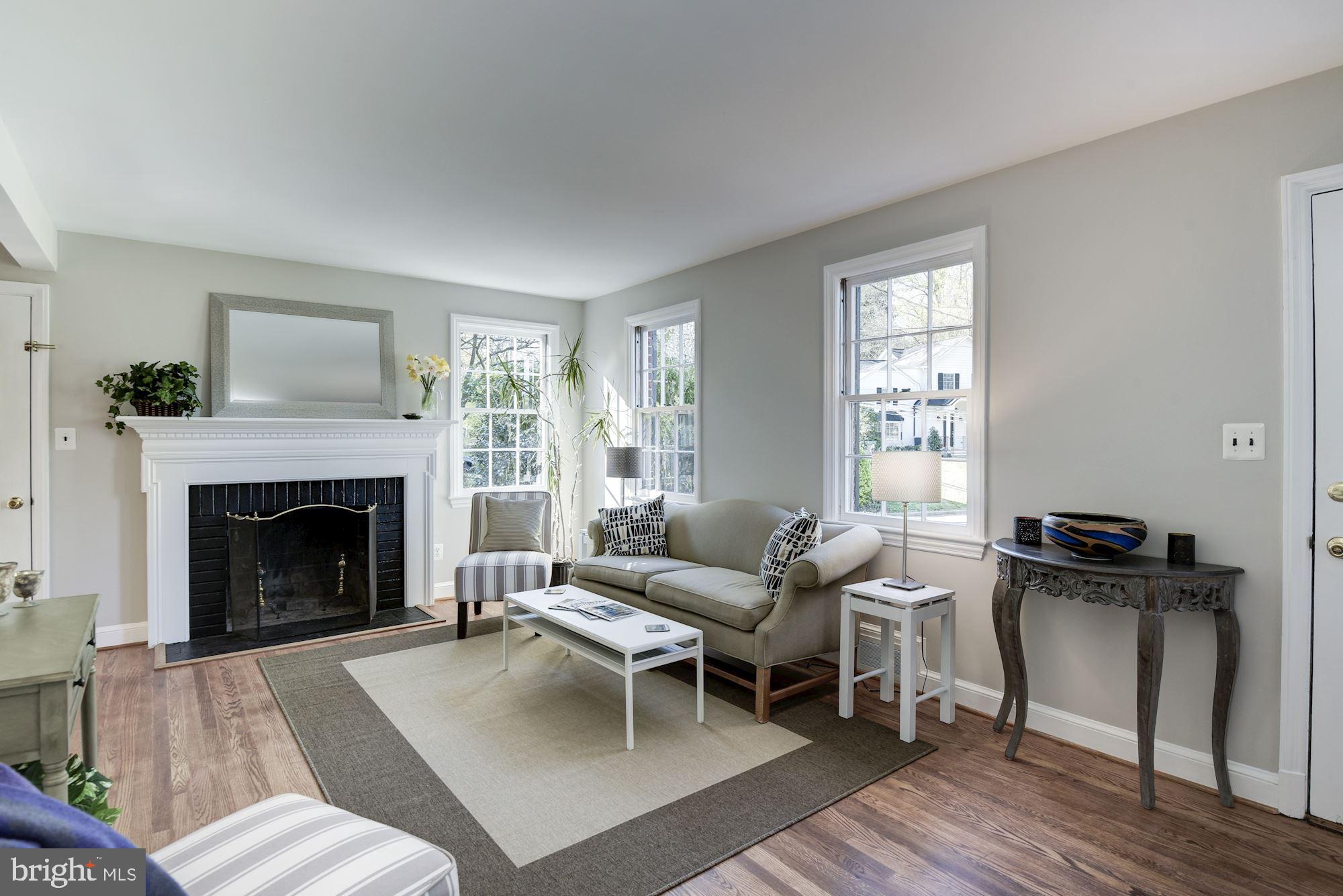 5909 Gloster Road Bethesda, MD 20816 - Photo 4 of 39 Living room with wood burning fireplace