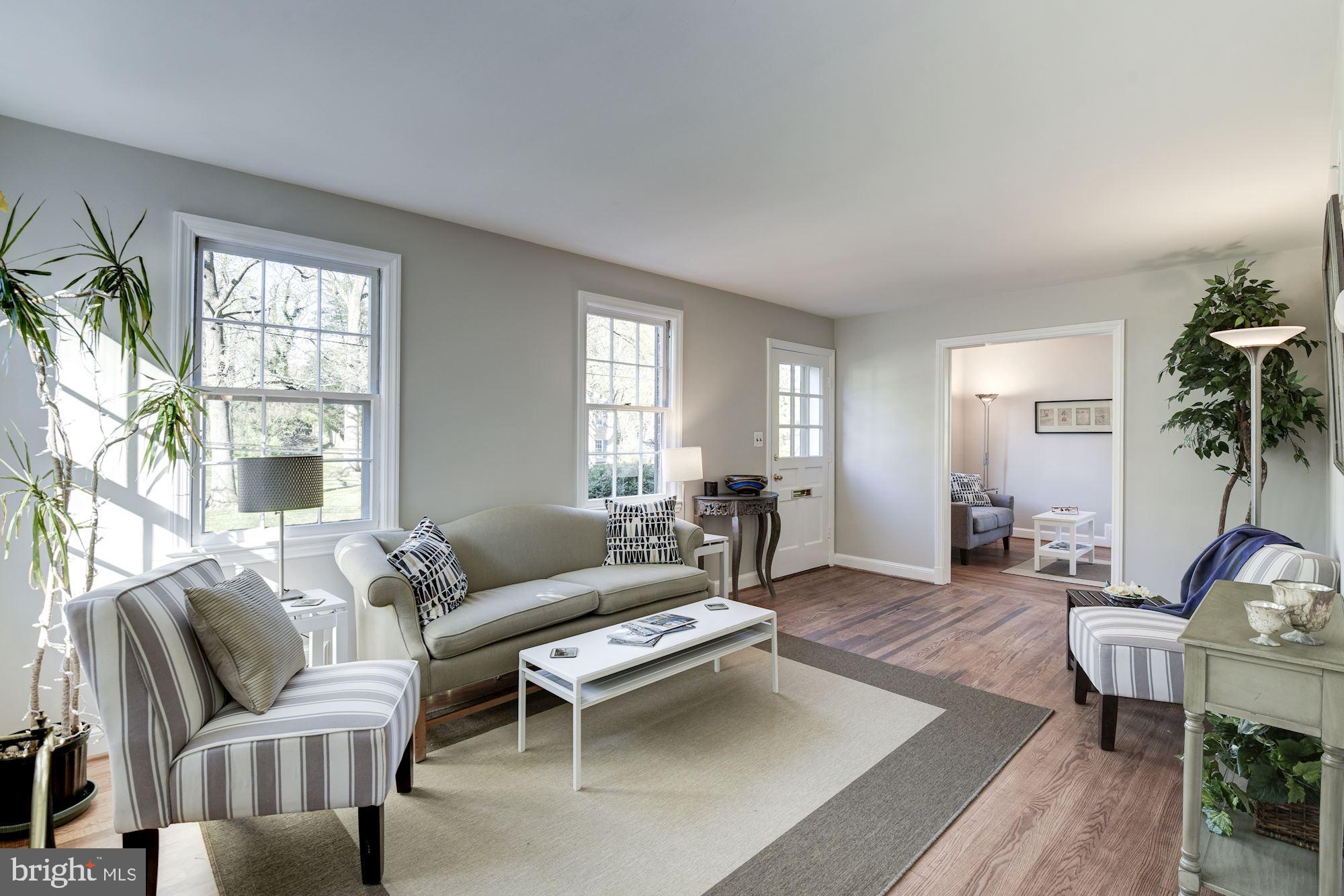 5909 Gloster Road Bethesda, MD 20816 - Photo 5 of 39 Sun filled living room looking towards den