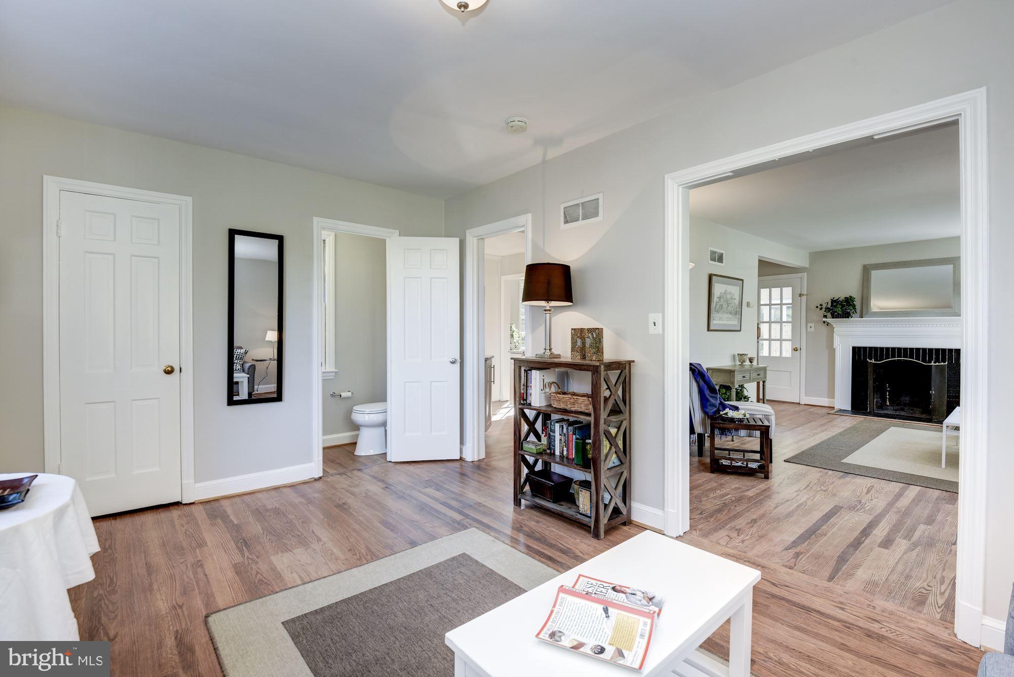 5909 Gloster Road Bethesda, MD 20816 - Photo 7 of 39 Den/Rec room with half bath.