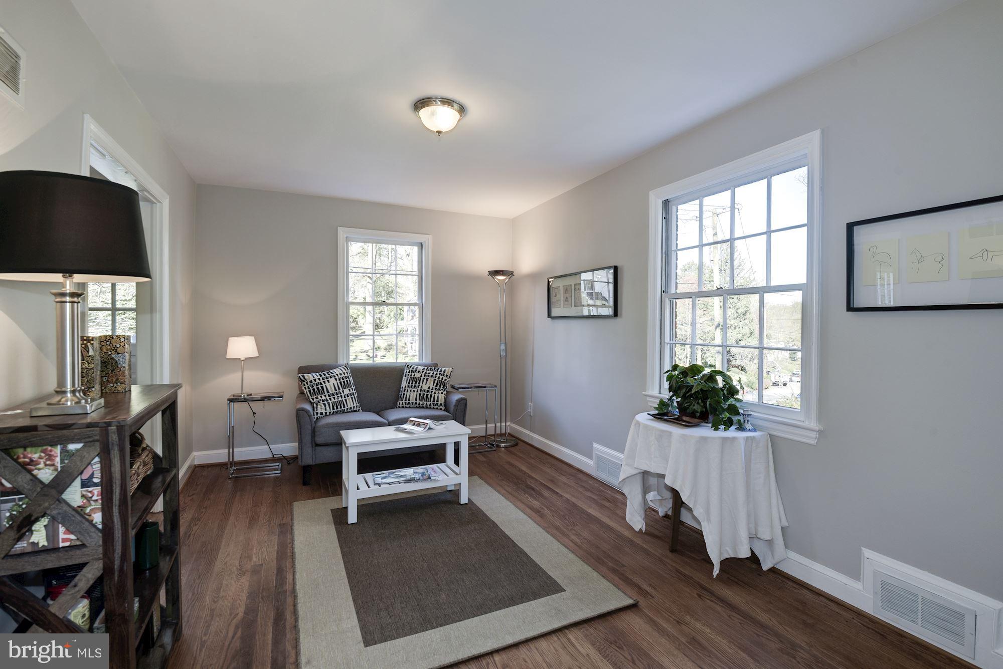 5909 Gloster Road Bethesda, MD 20816 - Photo 9 of 39 Den/ Rec room off living room and kitchen