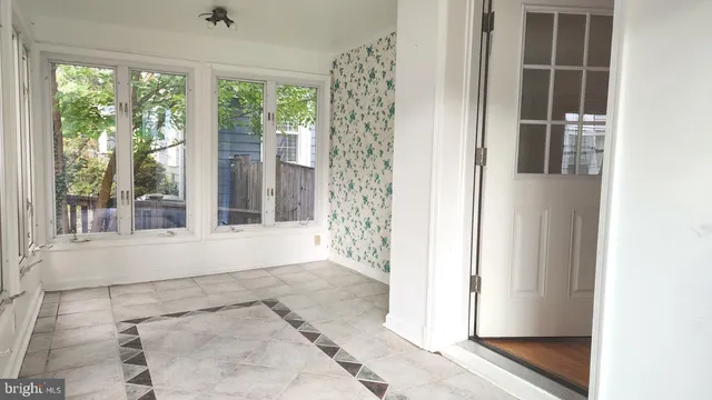 a view of a room with windows