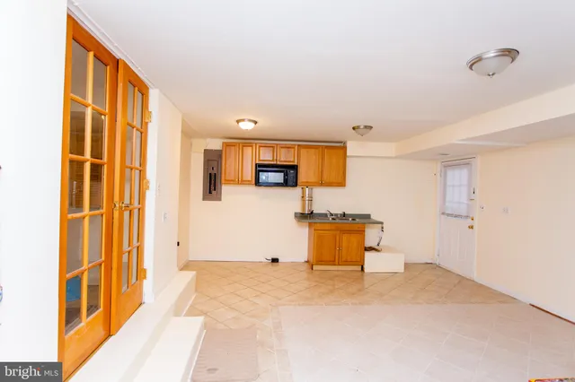 a view of a kitchen with a sink
