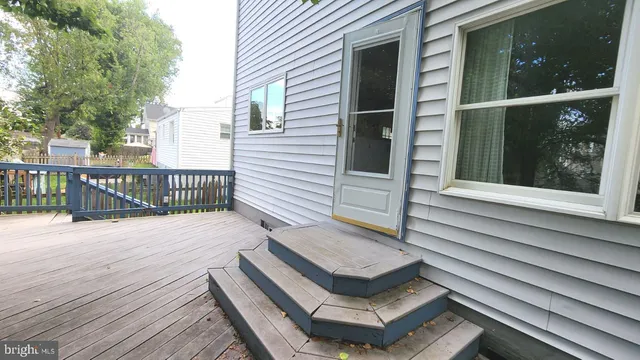 a view of a chairs and table in a patio