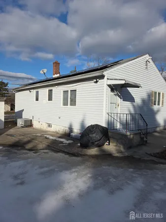 a view of backyard with cabin