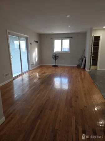 a view of an empty room and window