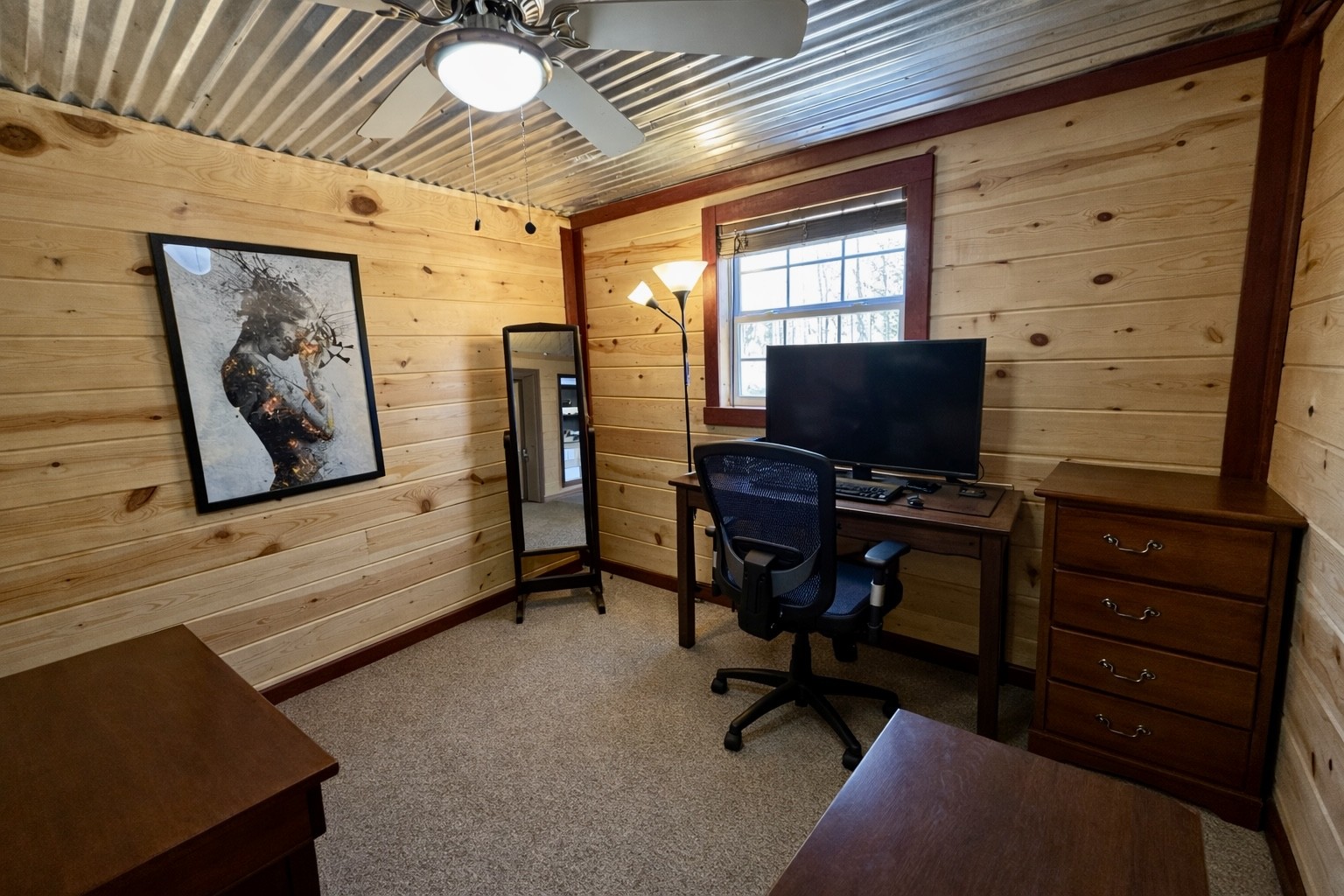 664 Russ Valley Road Lobelville, TN 37097 - Photo 30 of 63 a view of livingroom with workspace and a window