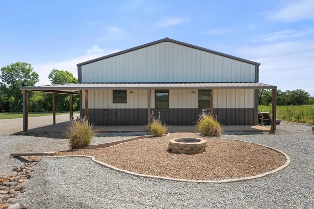 a backyard of house with seating space