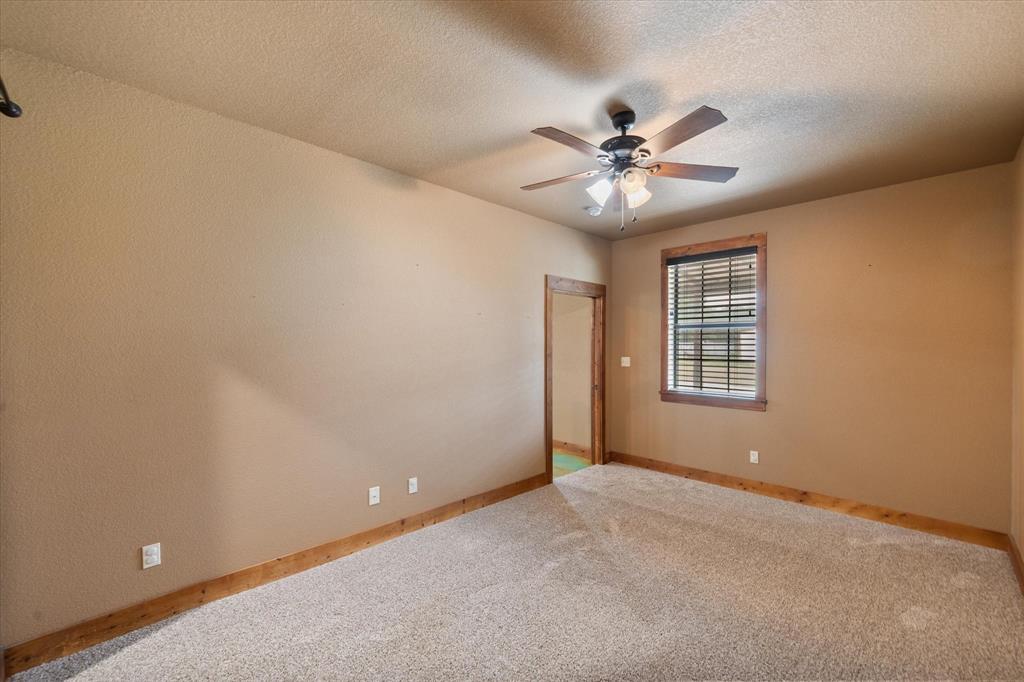 845 North Cardinal Road Azle, TX 76020 - Photo 15 of 37 a view of an empty room with a window