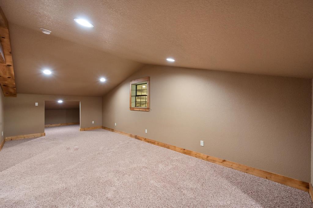 845 North Cardinal Road Azle, TX 76020 - Photo 16 of 37 an empty room with a empty space and windows