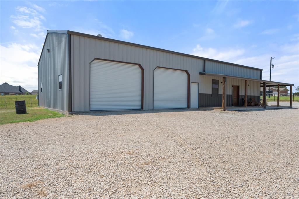 845 North Cardinal Road Azle, TX 76020 - Photo 28 of 37 a house view with a outdoor space