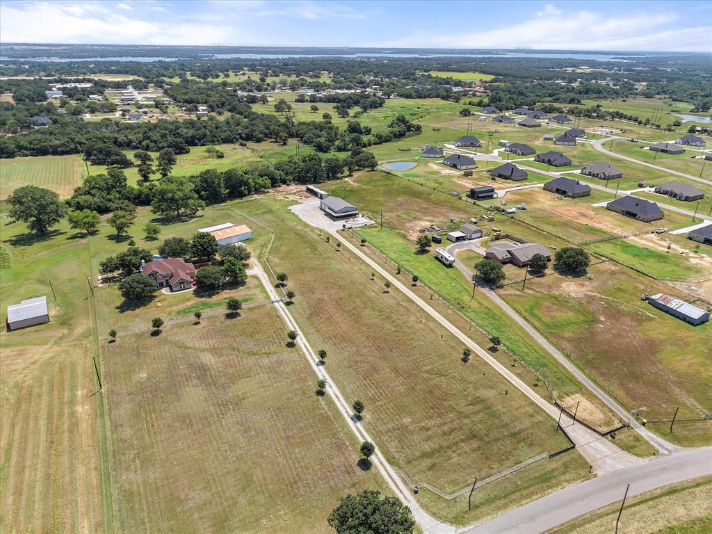 845 North Cardinal Road Azle, TX 76020 - Photo 32 of 37 an aerial view of residential houses with outdoor space