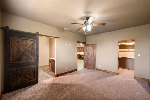 a view of a livingroom with a flat screen tv