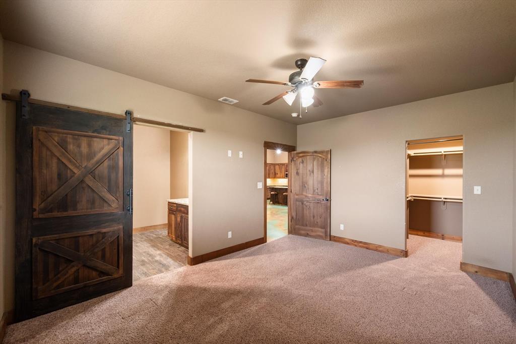845 North Cardinal Road Azle, TX 76020 - Photo 10 of 37 a view of a livingroom with a flat screen tv