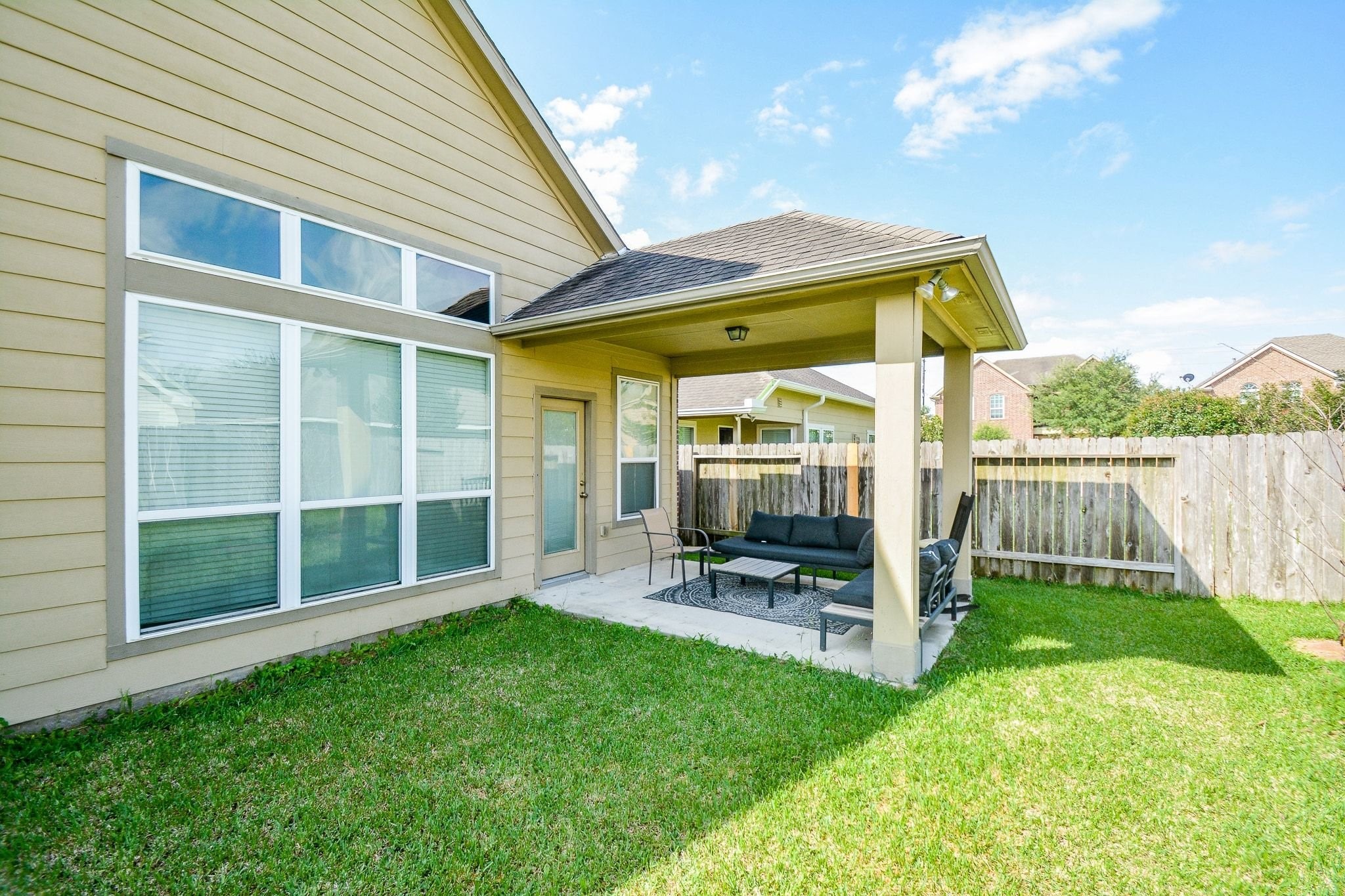 7046 Sliding Rock Circle Spring, TX 77379 - Photo 33 of 41 Enjoy outdoor living on this inviting covered patio, perfect for relaxation and entertaining in a private, fenced yard.