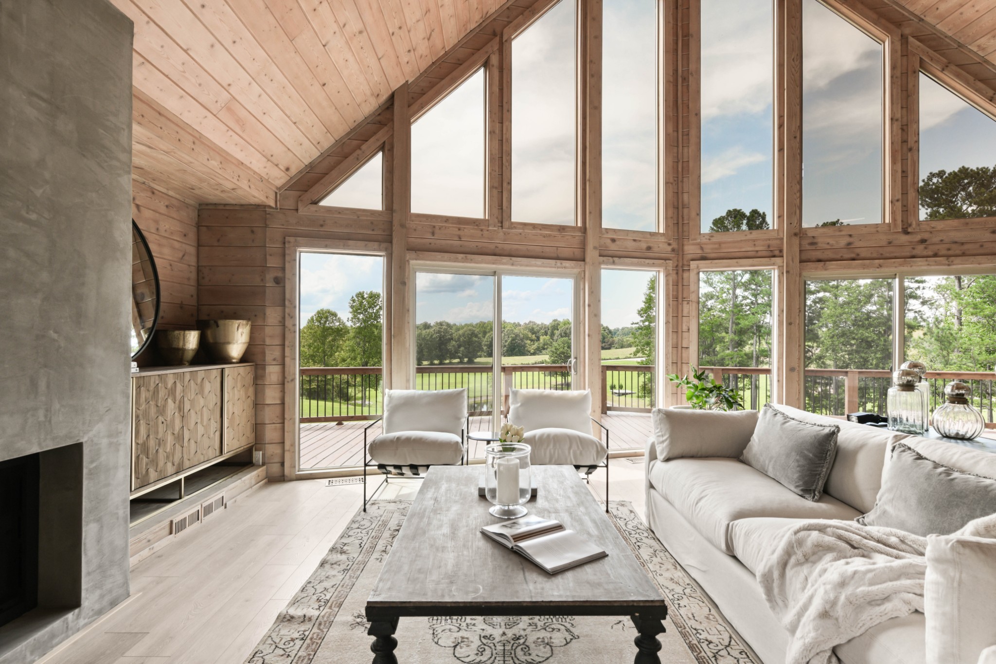 7720 Smith Road Primm Springs, TN 38476 - Photo 11 of 37 a living room with furniture and floor to ceiling windows