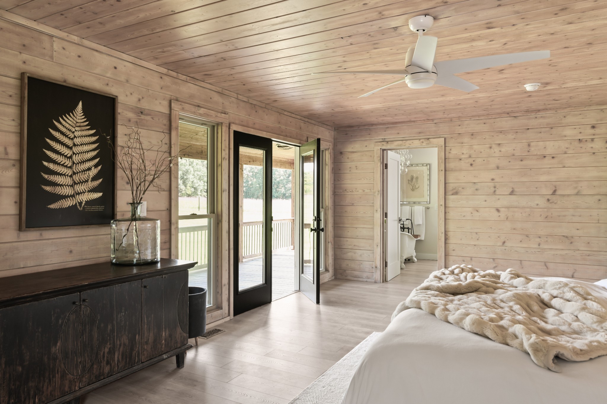 7720 Smith Road Primm Springs, TN 38476 - Photo 17 of 37 a spacious bedroom with a bed and a dresser