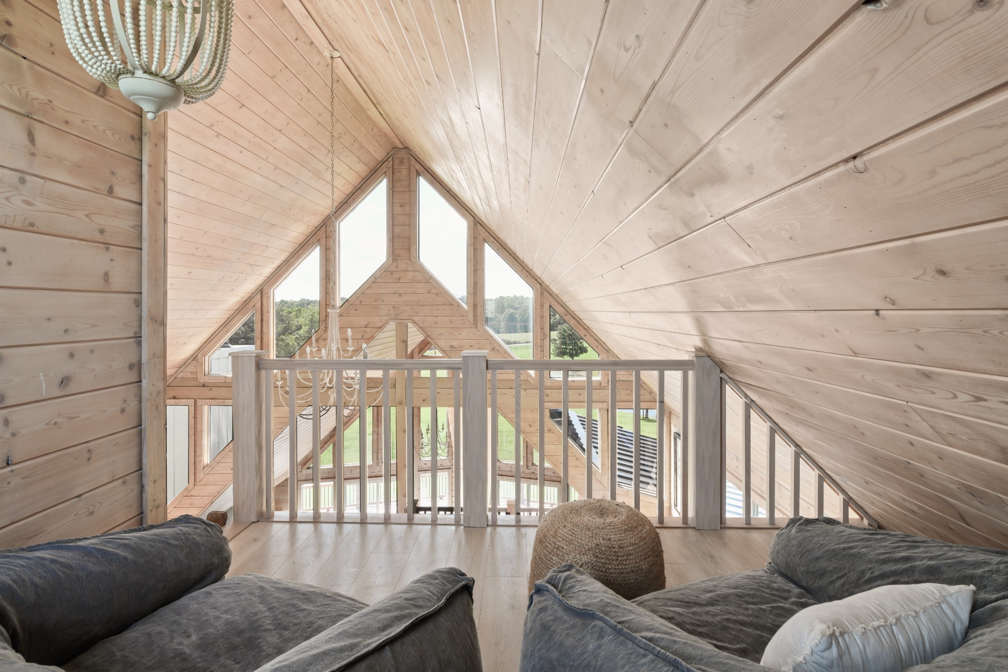 7720 Smith Road Primm Springs, TN 38476 - Photo 29 of 37 a living room with furniture and a floor to ceiling window
