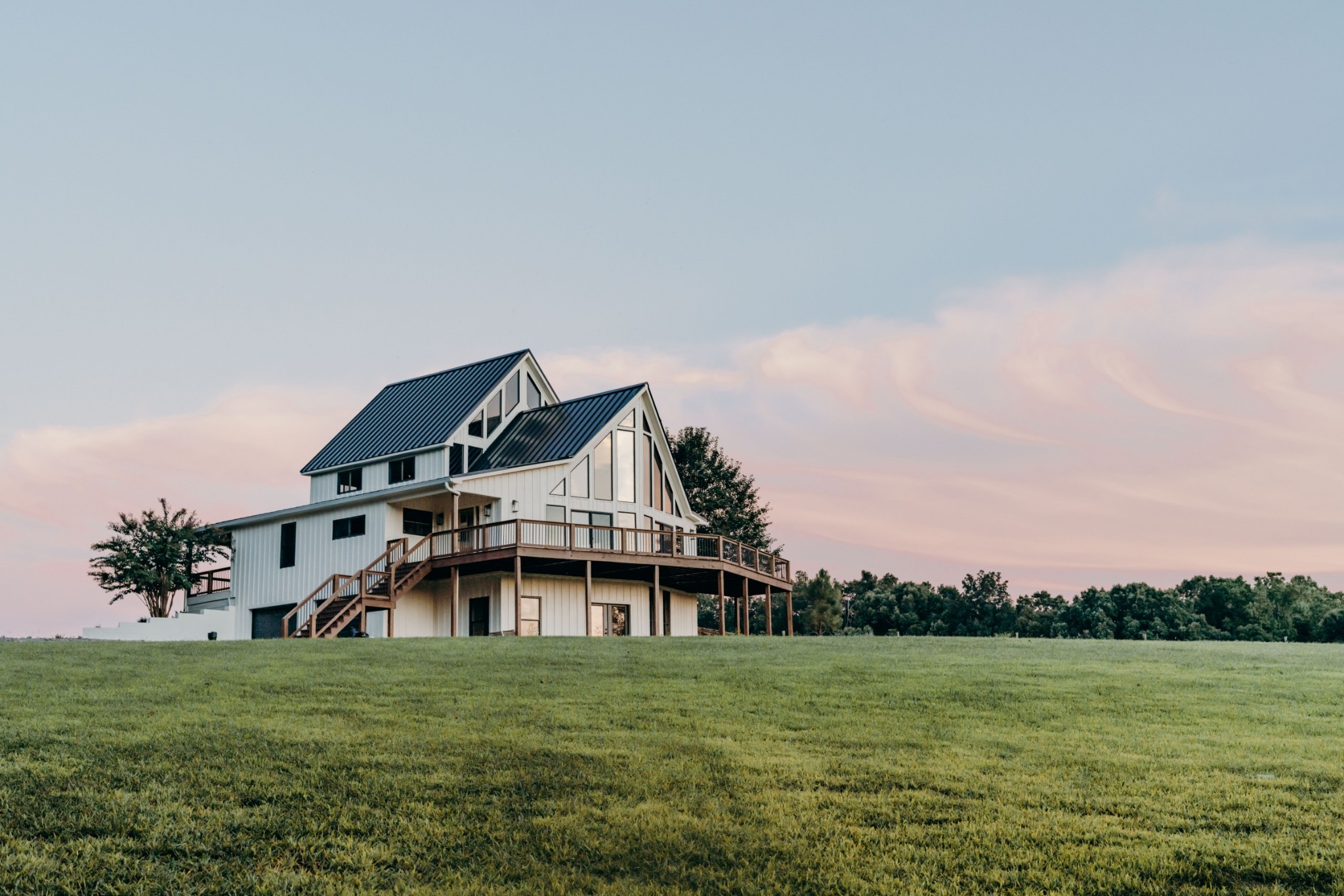 7720 Smith Road Primm Springs, TN 38476 - Photo 30 of 37 a front view of a house with a garden