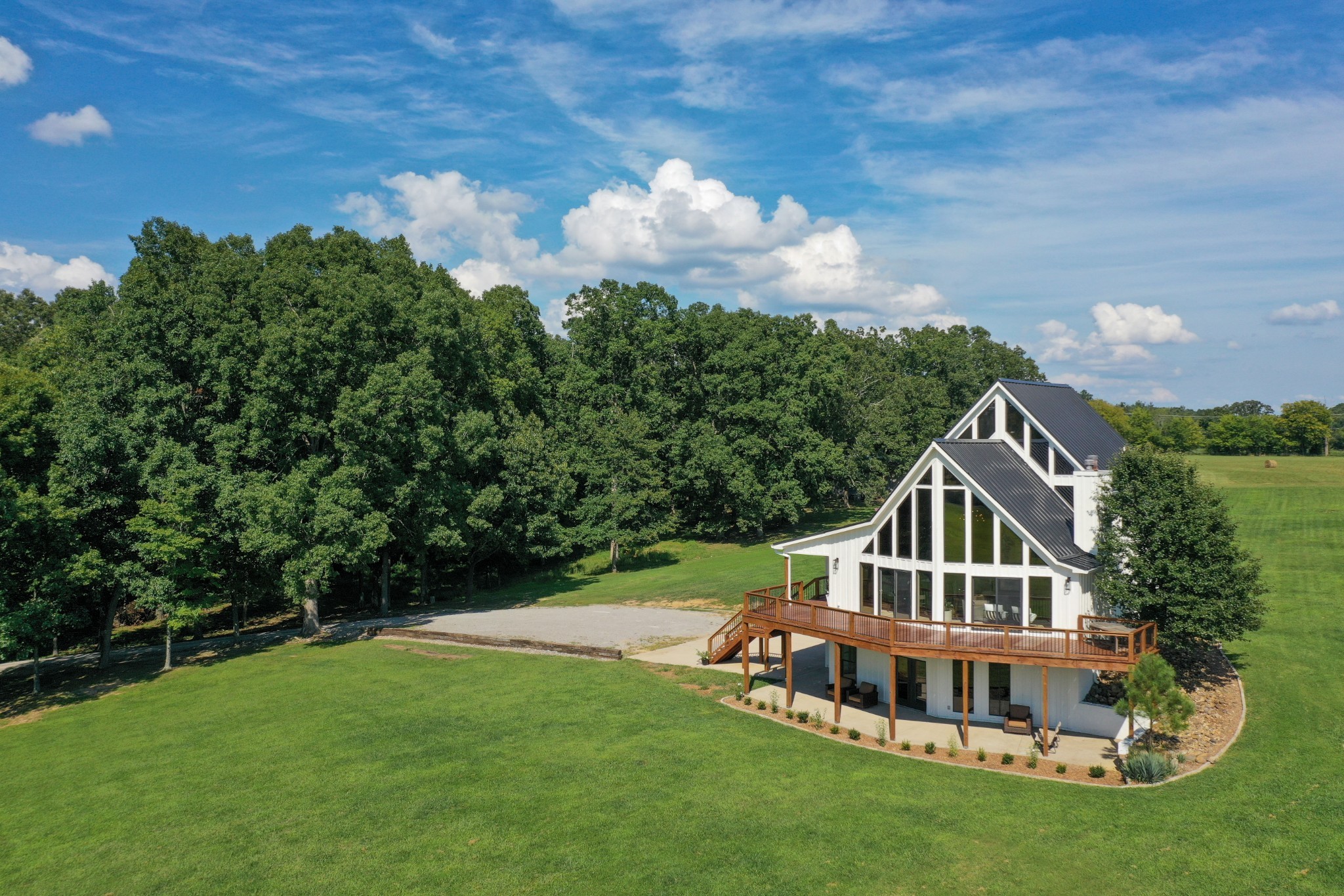 7720 Smith Road Primm Springs, TN 38476 - Photo 5 of 37 a front view of a house with a yard
