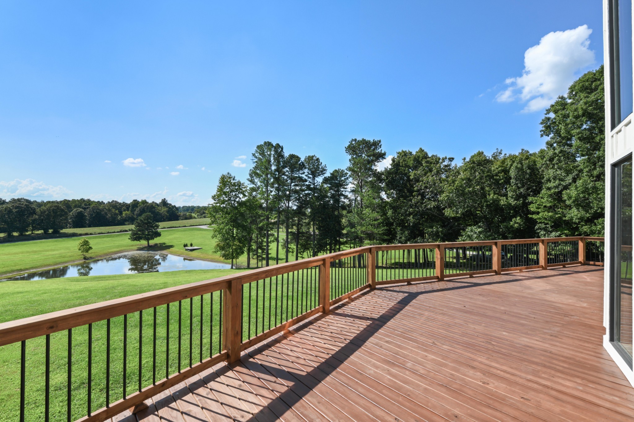 7720 Smith Road Primm Springs, TN 38476 - Photo 6 of 37 a view of a deck with sunset view