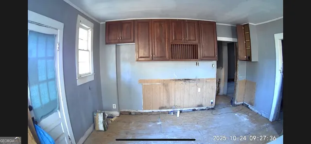 a view of a storage and utility room