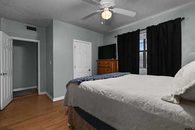 a view of an outdoor space and basketball court