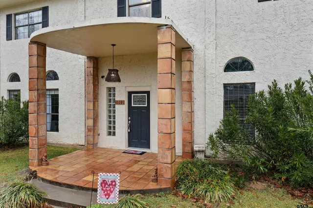 a front view of house with yard