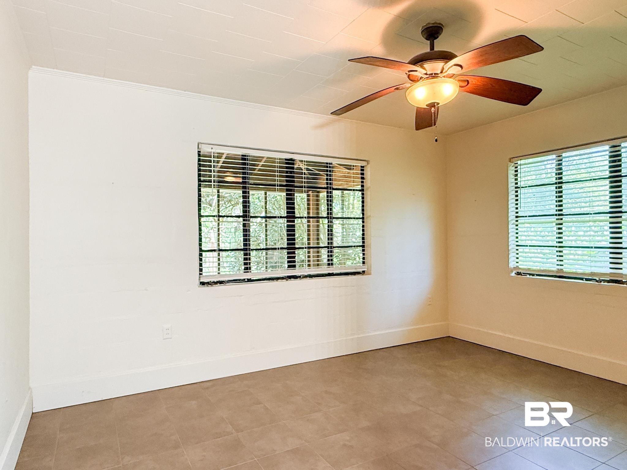 18711 Keller Road Foley, AL 36535 - Photo 26 of 38 Neutral wall tones complement the tile flooring