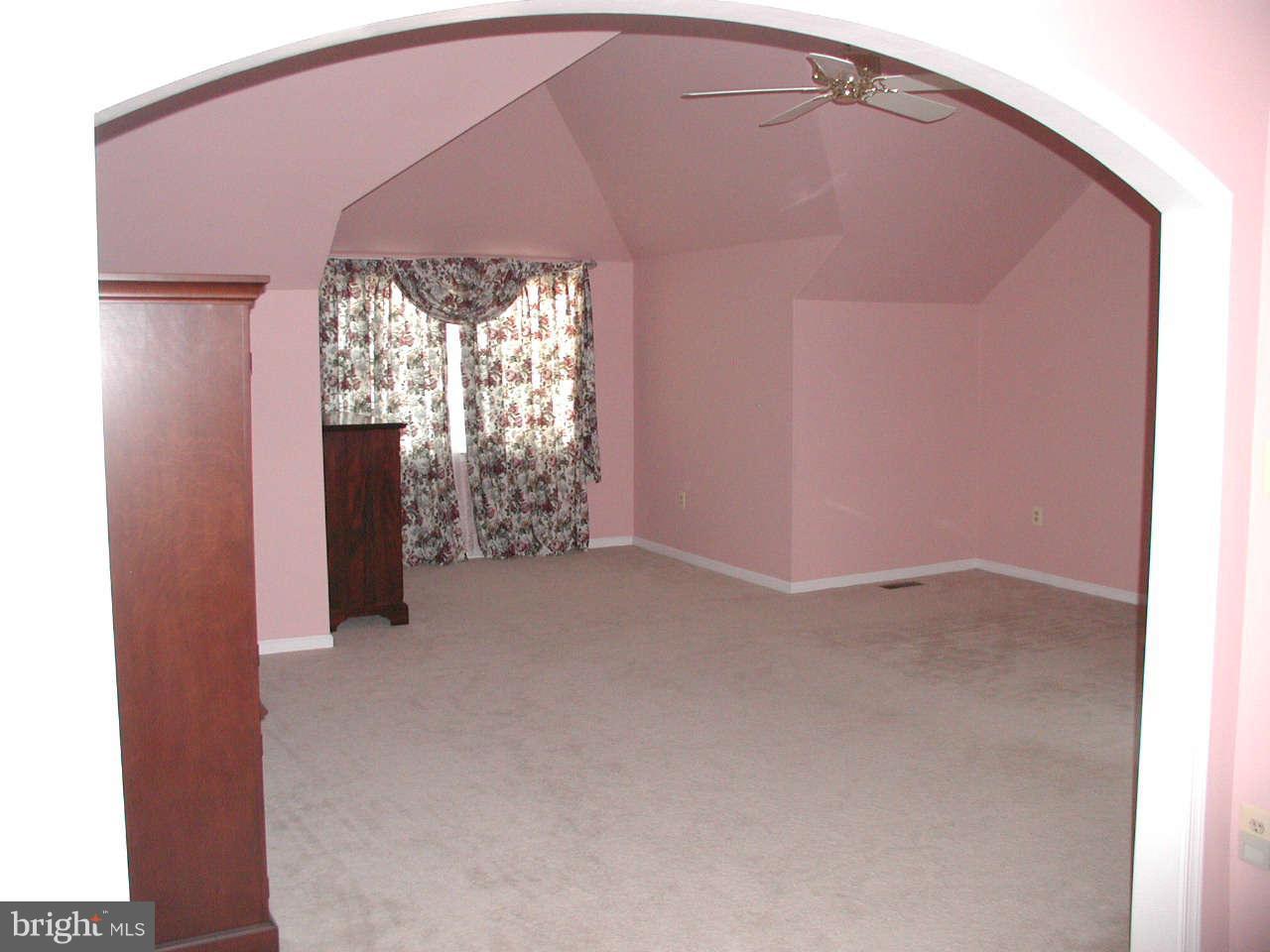 2206 Central Avenue Vienna, VA 22182 - Photo 2 of 20 a view of an empty room with a fireplace