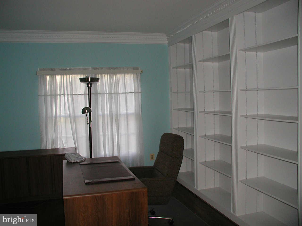 2206 Central Avenue Vienna, VA 22182 - Photo 17 of 20 a room with a chair and a window