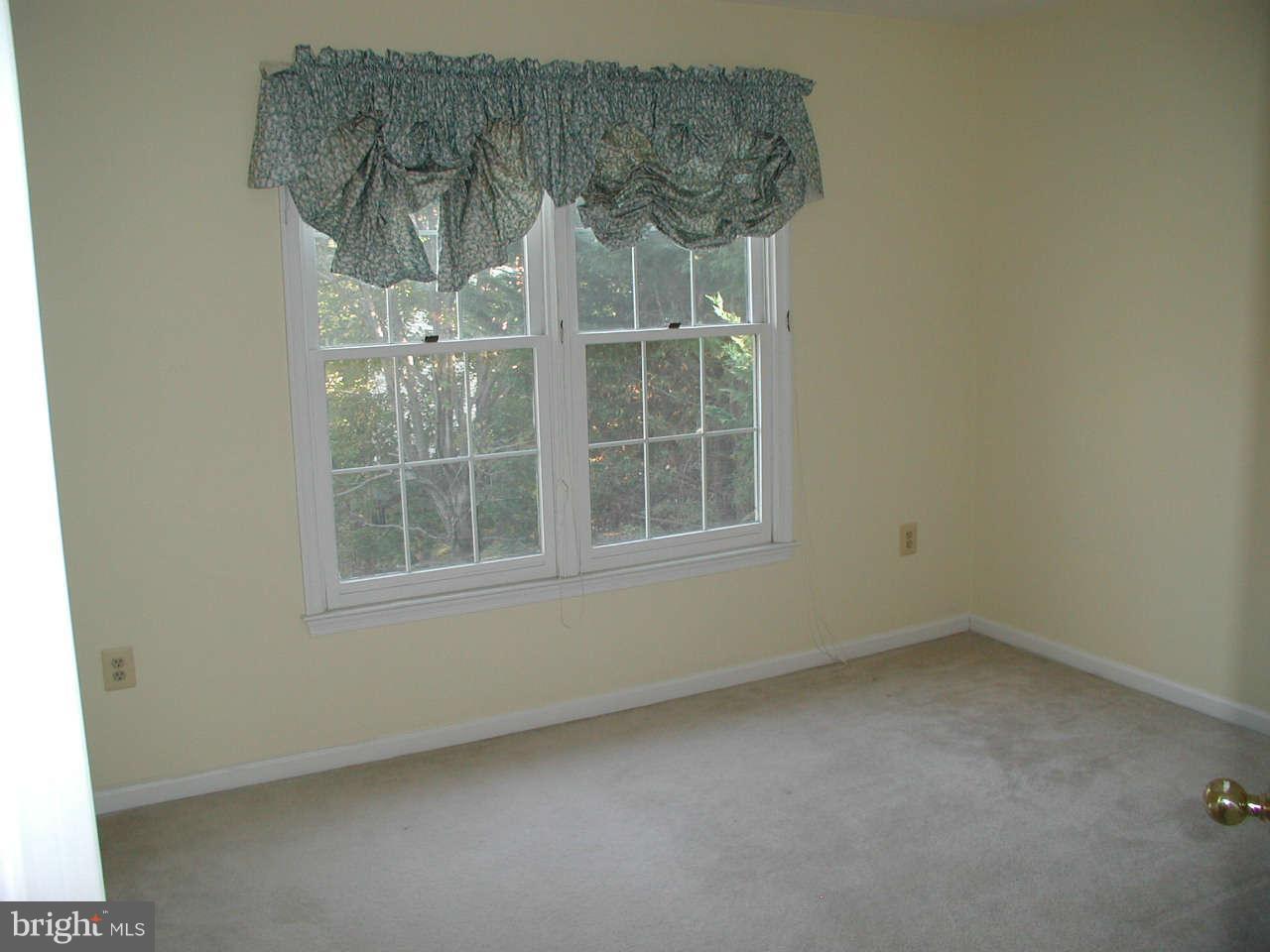 2206 Central Avenue Vienna, VA 22182 - Photo 6 of 20 an empty room with a window