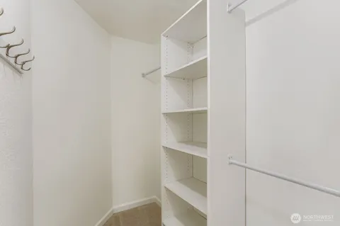 a view of an empty walk in closet