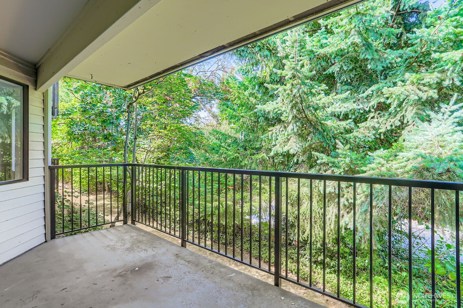 830 Kirkland Way, Unit 204 Kirkland, WA 98033 - Photo 23 of 27 a view of balcony with green space