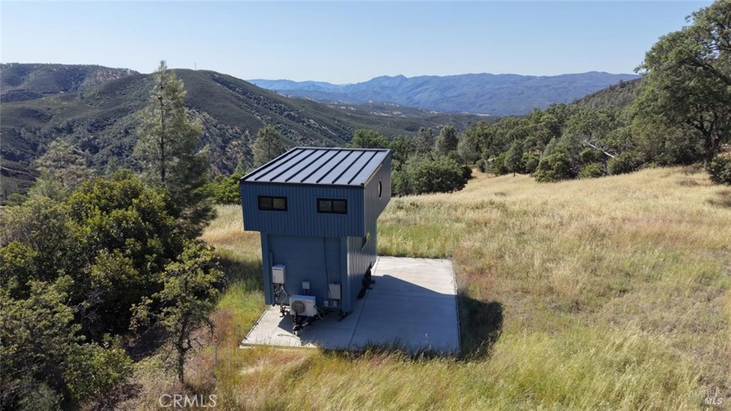 552 Watertrough Road Clearlake Oaks, CA 95423 - Photo 3 of 24 a view of a house with a yard