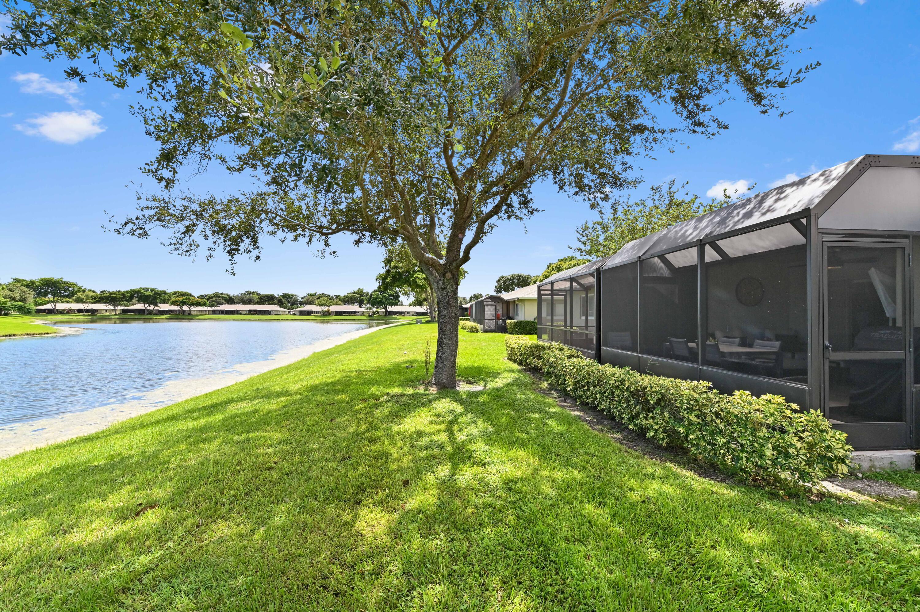 18824 Argosy Drive, Unit C Boca Raton, FL 33496 - Photo 17 of 18 a view of a back yard