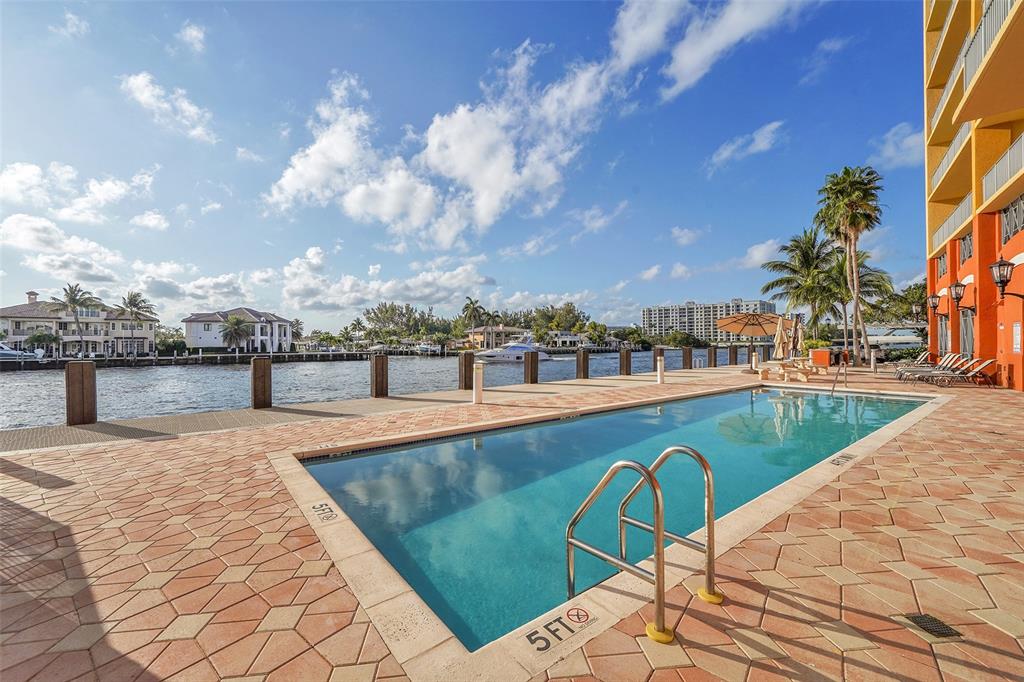 821 North Riverside Drive, Unit PH2 Pompano Beach, FL 33062 - Photo 77 of 95 a view of swimming pool with seating space