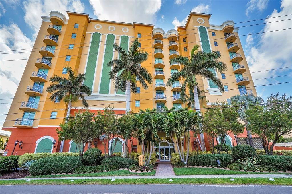 821 North Riverside Drive, Unit PH2 Pompano Beach, FL 33062 - Photo 10 of 95 a front view of multi story residential apartment building with yard and parking space