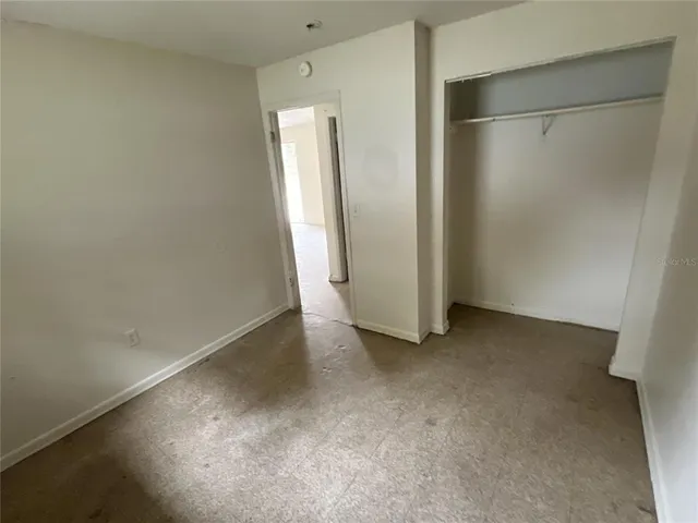 an empty room with a door