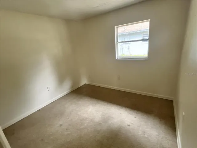 an empty room with a window